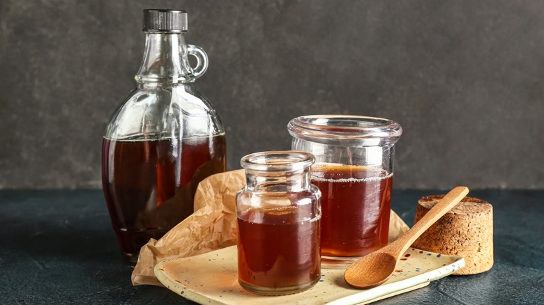 Maple syrup in containers