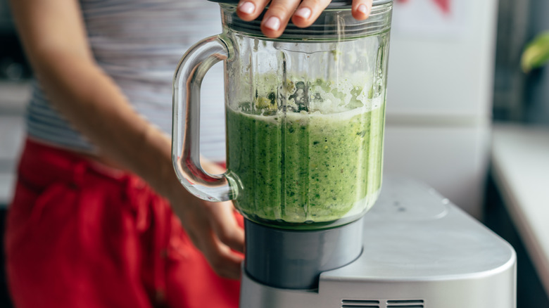Blender with green smoothie