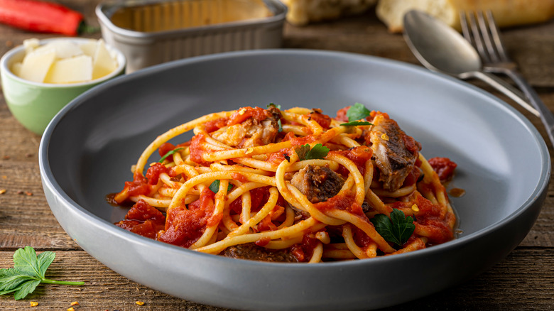 Pasta with sardines in bowl