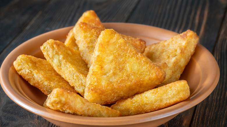 Hash brown triangles in a bowl