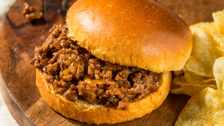 Sloppy Joes filling in a bun with chips