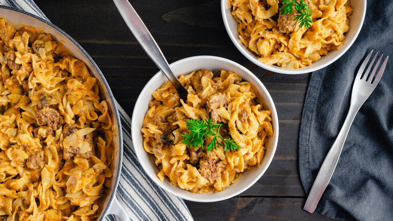 Sour cream pasta in bowls