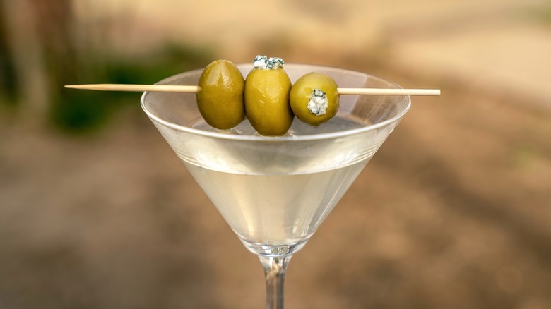 Dirty martini with stuffed olives