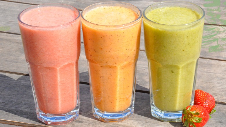 Colorful smoothie drinks in glasses