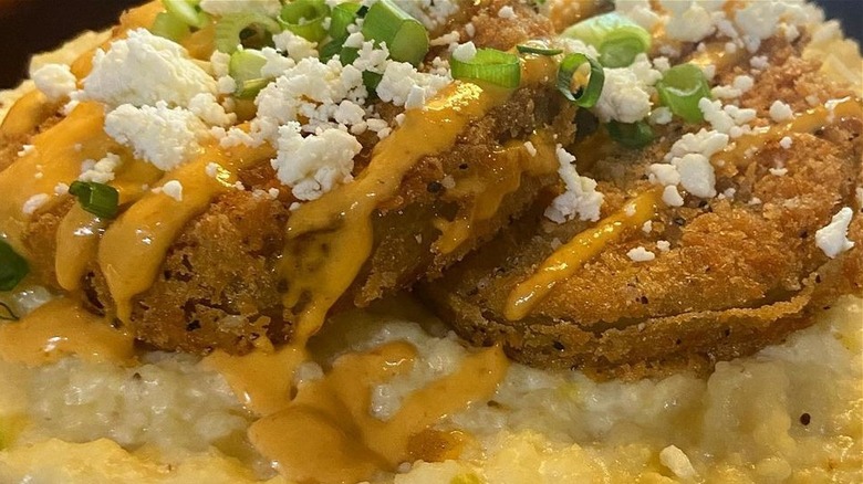 Fried green tomatoes on grits