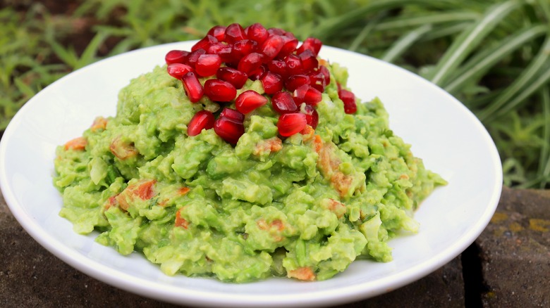 guacamole with pomegranate seeds