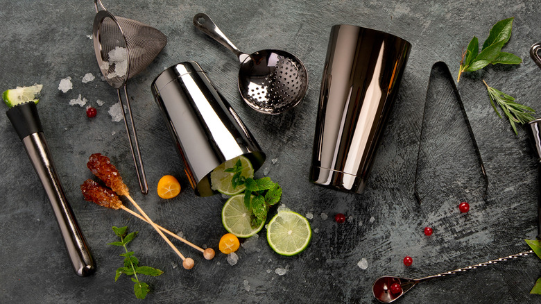 cocktail tools on grey background