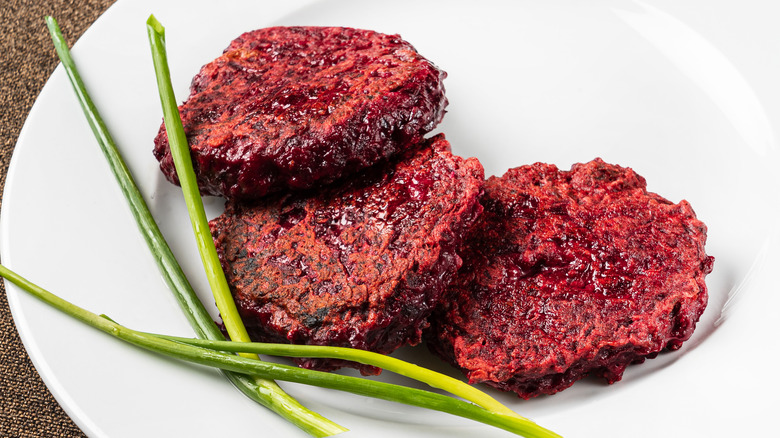 Beet patties on white plate 