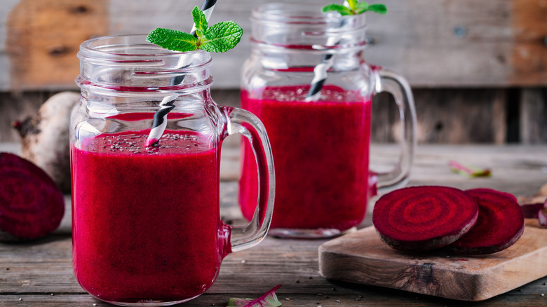 Red smoothies in jars