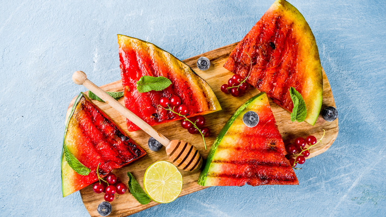 Grilled watermelon slices on board