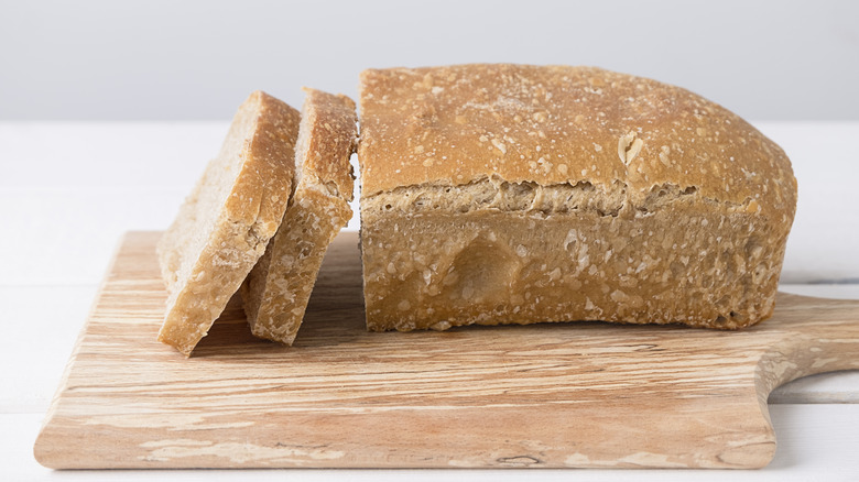 Bread loaf on board