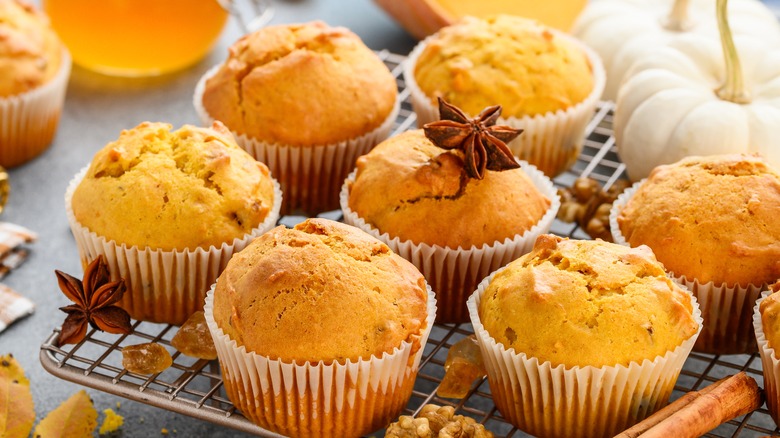 Pumpkin cupcakes on wire rack