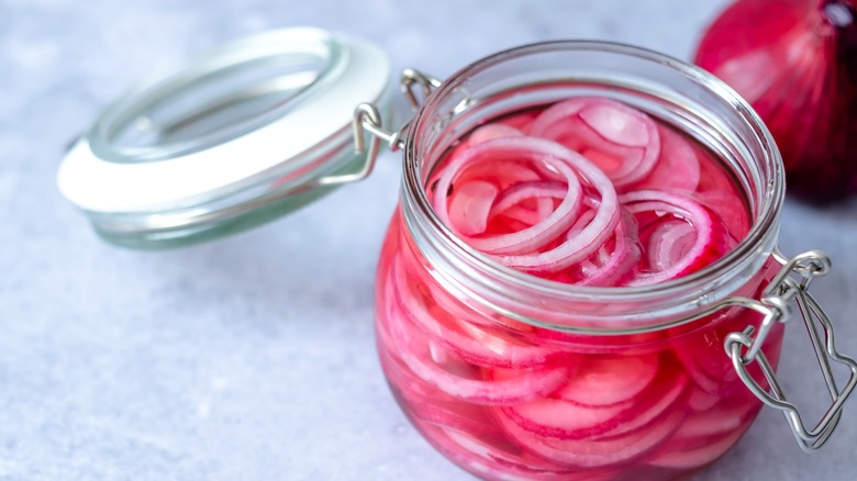 Pickled red onion in glass jar