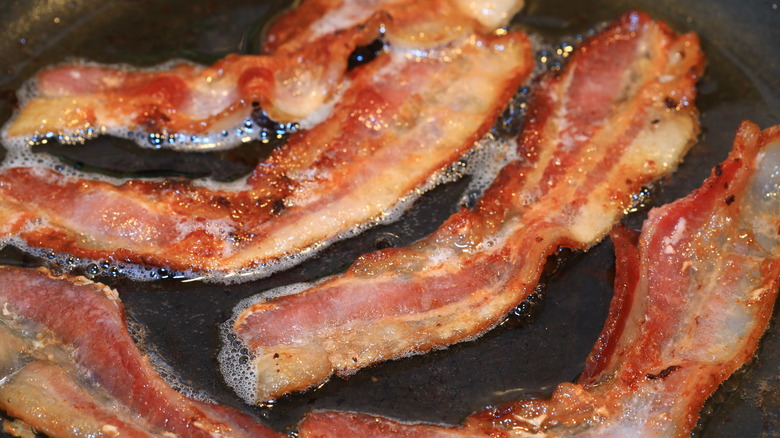 Bacon cooking in a pan