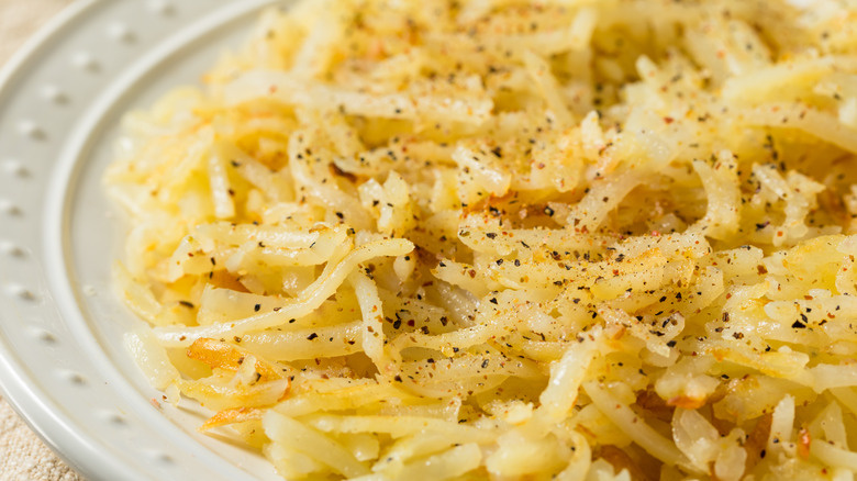 Shredded hash browns on plate