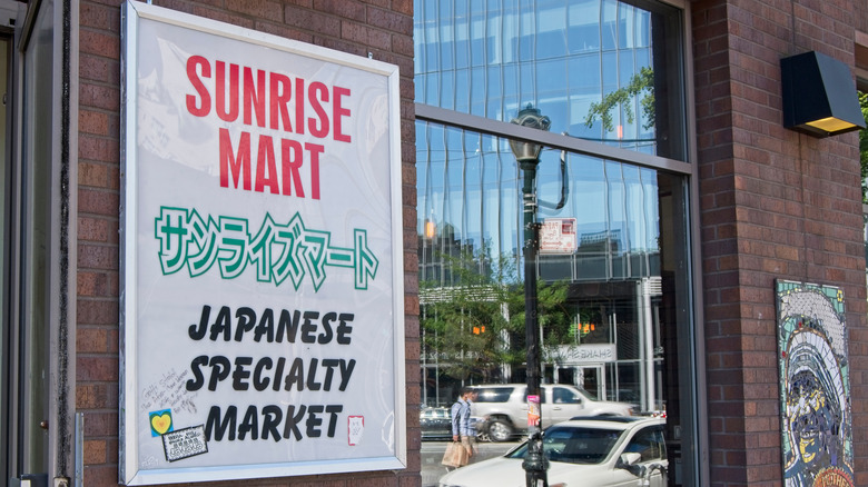 exterior sign for sunrise market