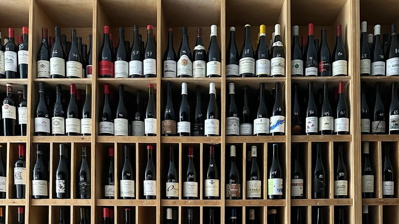 Shelves of red wine at Leon and Son