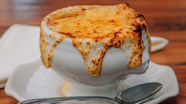 French onion soup in white crock