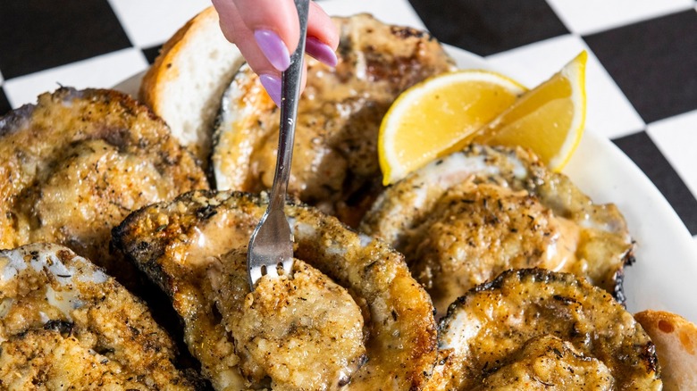 Buttery charbroiled oysters and lemon