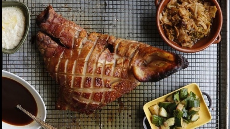 Whole roasted pig's head tray