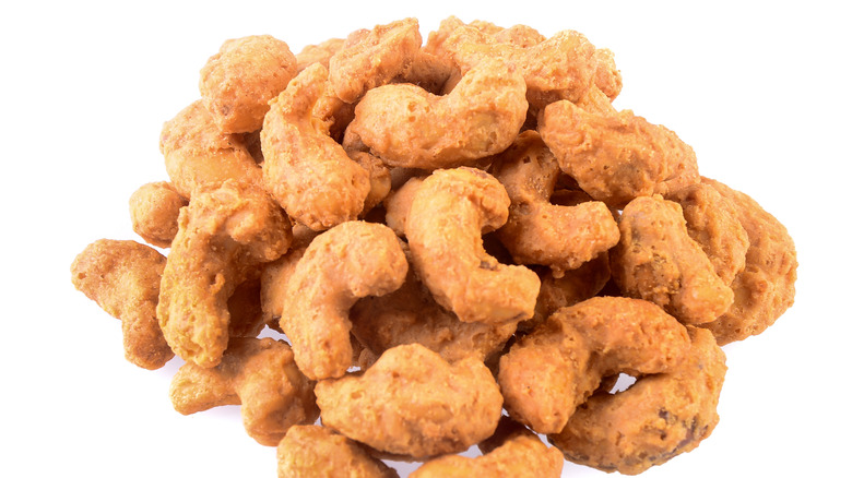 Roasted cashews on white background