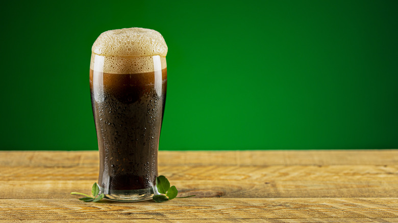 dark beer on wooden table