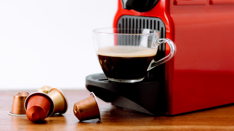 Nespresso machine and coffee cup