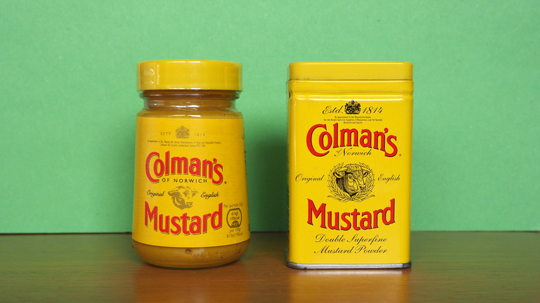 Jars of yellow colman's mustard