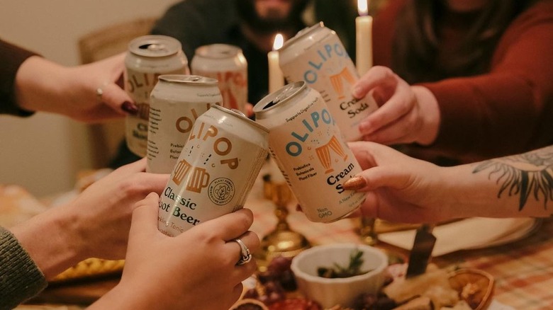 Six cans of Olipop