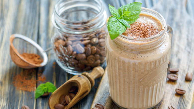 Brown smoothie in glass mug 