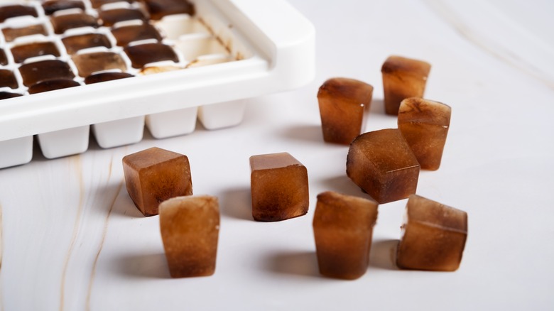 Coffee ice cubes on counter