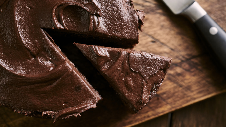 Chocolate cake with slice cut 