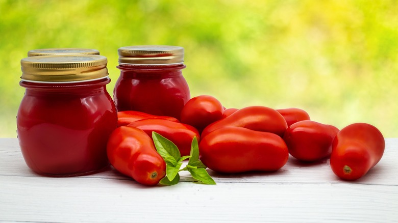 Table with Roma tomatoes