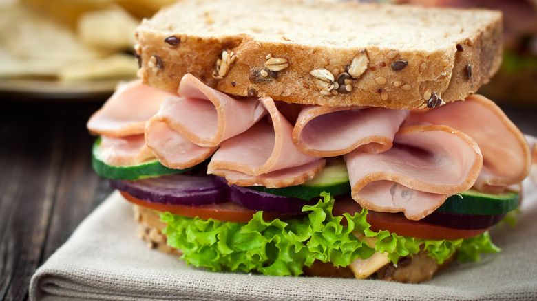 Table with ham and lettuce