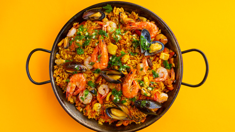 Seafood paella in pan