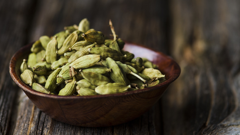 Cardamom pods in a bowl