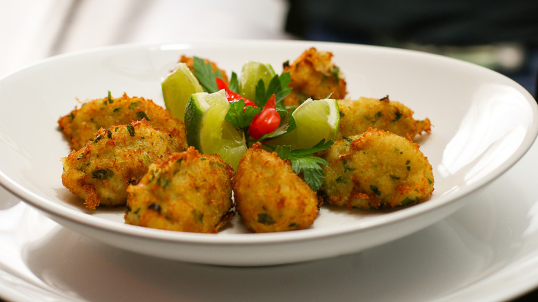 Conch fritters white plate