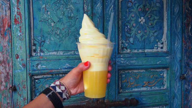 Hand holding Dole Whip