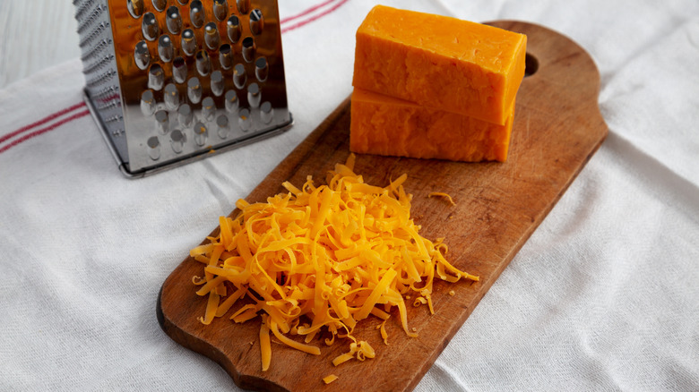cheese on cutting board