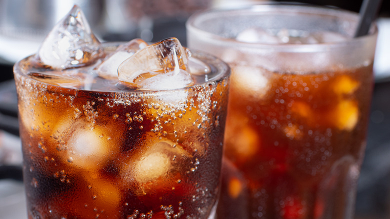 Coca-Cola in glasses with ice