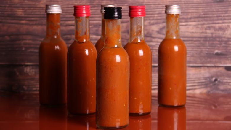 assorted hot sauce bottles