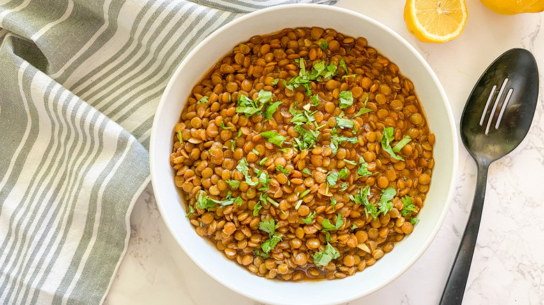 lentils in bowl with herbs