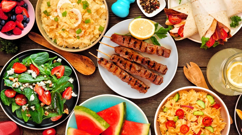 Summer foods arranged on picnic table