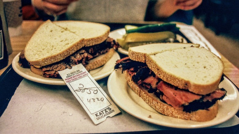 pastrami on rye with pickles at katz's deli