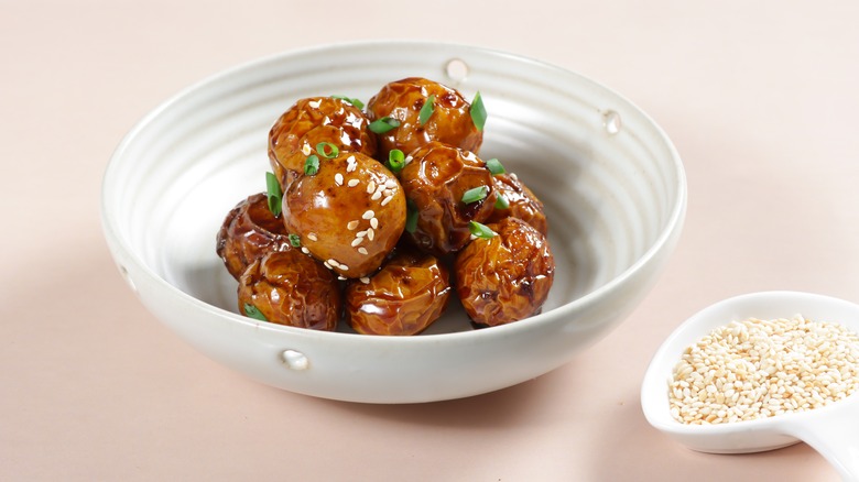 glazed roasted potatoes in bowl