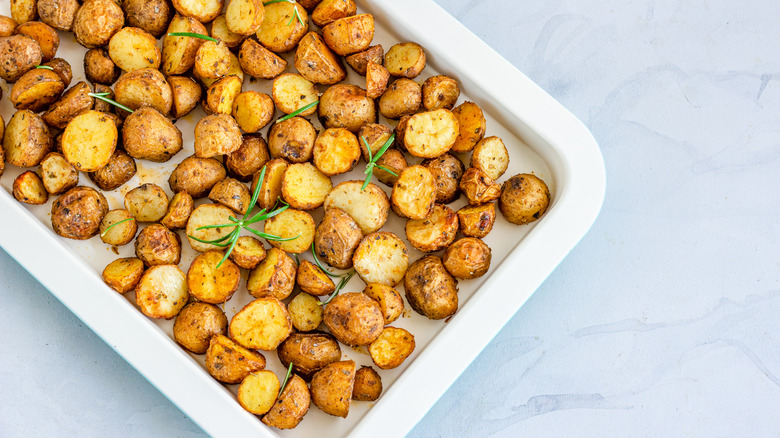 roasted potatoes on white pan