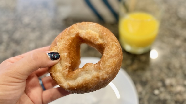 Holding Glazed Donut