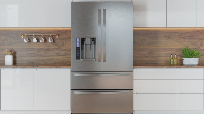view of modern kitchen with a fridge