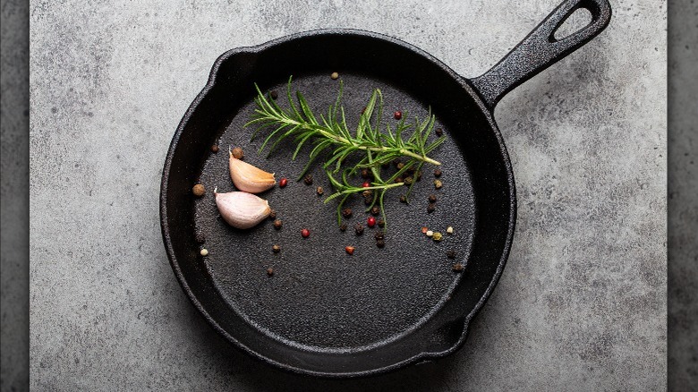 Cast iron pan with aromatics