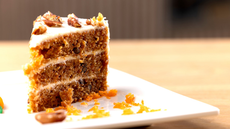 Carrot cake with orange zest on plate